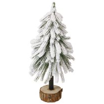 Artikel Dekorativ julgran täckt av snö på träfot Ø15cm H30cm