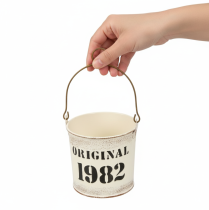 Artikel Dekorativ hink med handtag “Original 1982” Krämfärgad Ø12/10cm 2×2-delat set