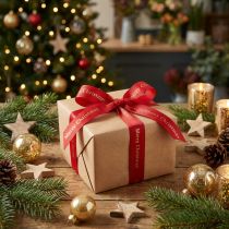 Artikel Rött julband med guld "Merry Christmas" bokstäver, bredd 25mm, längd 20m