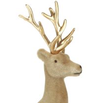 Artikel Sittande hjortdekoration flockad ljusbrun 15×6×15,5 cm