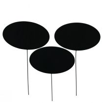 Artikel Tavla ovala svarta dekorativa pluggar trä metall 10x6cm 12st