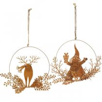 Artikel Dekorationsring till jul, renar i ringen, jultomte med present, metalldekoration patina Ø18cm set om 2