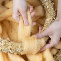 Artikel Ullsnöre, ullband, krämfärgad orange, 10m ull för kransar och arrangemang