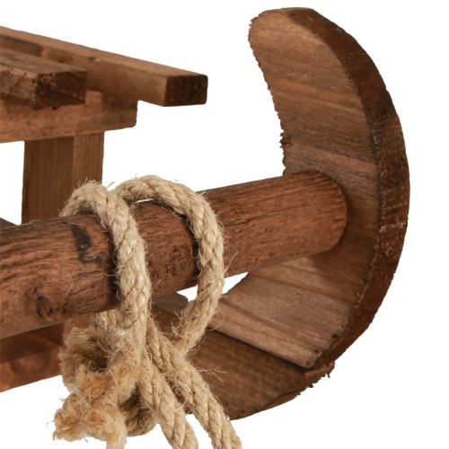 Artikel Dekorativ slädebrun vinterdekoration av trä 30x18x12cm