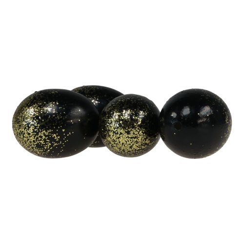 Artikel Dekorativa påskägg äkta gåsägg svart med guldglitter H7,5–8,5cm 10 st.