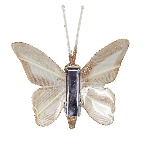Artikel Fjäderfjärilar på klämma vitguld 5cmx4,5cm 4 st