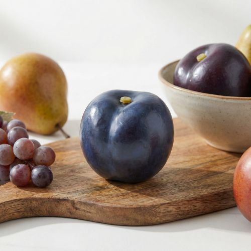 Artikel Plommonblå konstfruktmatdocka Ø6,5cm