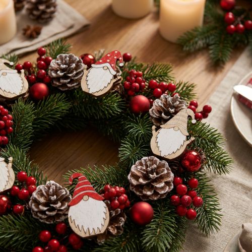 Jultomtar av trä för limning 2x3,5cm 48 st | Floristik24.se