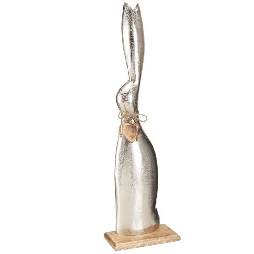 Artikel Dekorativt kaninsilver på träbotten – Elegant påskfigur med hjärthänge H60cm