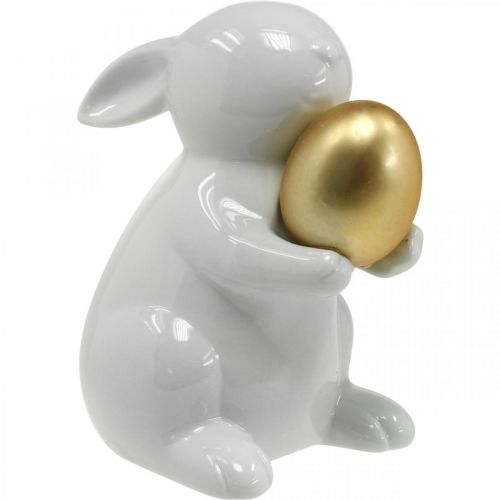 Floristik24 Kanin med gyllene ägg keramik, påskdekoration elegant vit, gyllene H15cm