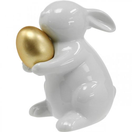 Floristik24 Kanin med gyllene ägg keramik, påskdekoration elegant vit, gyllene H15cm