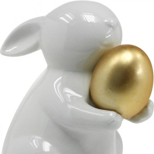 Floristik24 Kanin med gyllene ägg keramik, påskdekoration elegant vit, gyllene H15cm