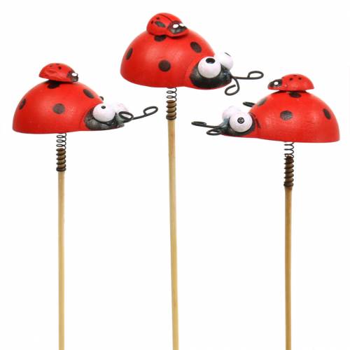 Deco pluggar nyckelpiga på pinne trä röd, svart 4cm x 2,5cm H23,5cm 16 stycken