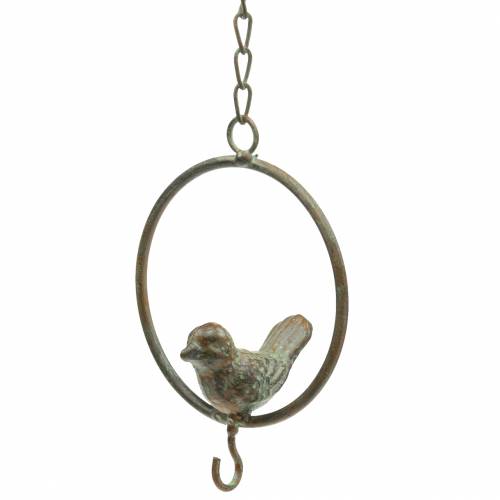 Artikel Fågel i en ring som mathängare brungrön metall Ø9.8cm L32.5cm