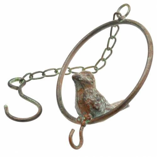 Artikel Fågel i en ring som mathängare brungrön metall Ø9.8cm L32.5cm