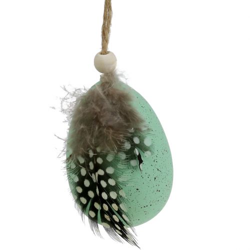 Floristik24 Plastägg med fjädrar blandade färger 7cm 6st