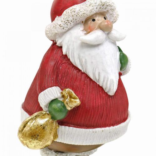 Floristik24 Dekorativ figur jultomten med stjärna / väska H13cm 2st