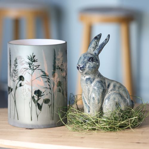 Artikel Lykta av vitt glas med grönt ängsmotiv H18cm