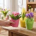 Planteringspapper växtkruka vävd rosa gulgrön Ø9cm H18cm 9st | Floristik24.se