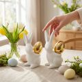 Kaniner med guldägg, keramiska kaniner till påsk ädelvit, gyllene H13cm 2st | Floristik24.se